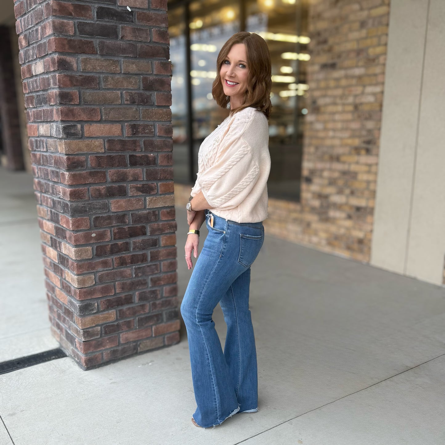 Risen Mid Rise Flare Jeans