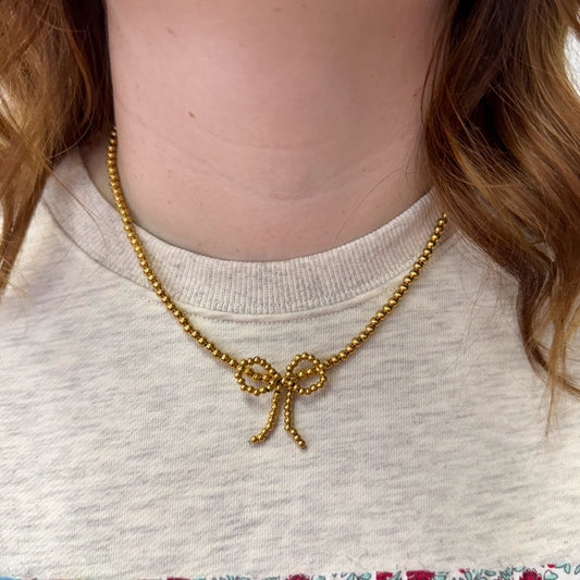 Gold Beaded Bow Necklace